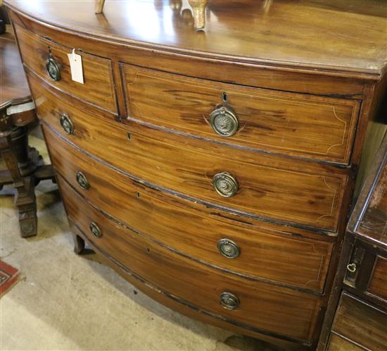 Regency mahogany satinwood cross-banded and line-inlaid bow-fronted chest of drawers(-)